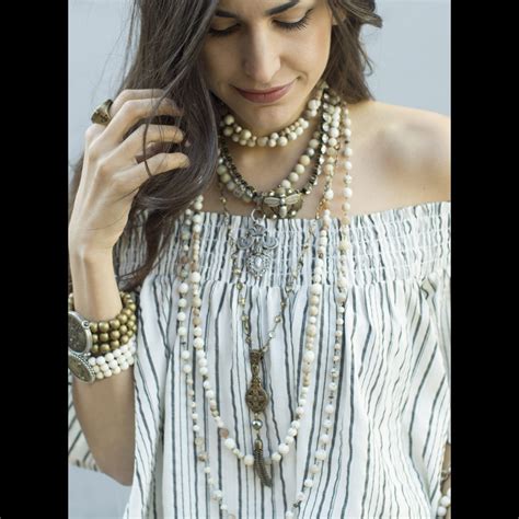 French kande - French Kande offers necklaces, earrings and bracelets featuring vintage French medallions from the 1960's. Shop online for natural pearls, semi-precious stones, Austrian crystals and more.